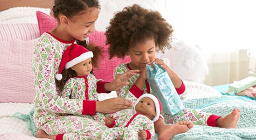 girl and doll matching pajamas