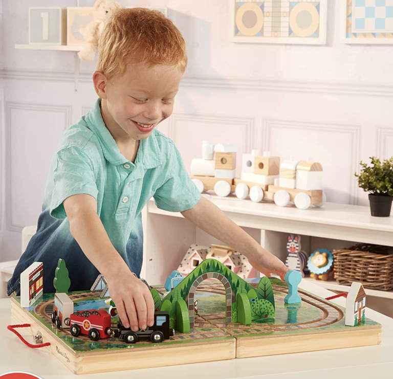 Melissa & Doug 17-Piece Wooden Take-Along Tabletop Railroad for just $17.62! (Lowest Price!)