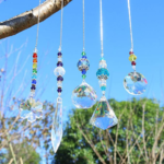 TWO 5-Count Window Hanging Crystal Pendant Set $14.99 After Coupon (Reg. $31.98) – $7.50 each + Get any 2 for $16.99!