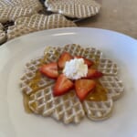 1-ingredient soaked quinoa waffles with strawberries on top