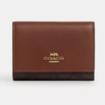 Coach Outlet Women's Wallets: Up to 70% off + free shipping w/ $50