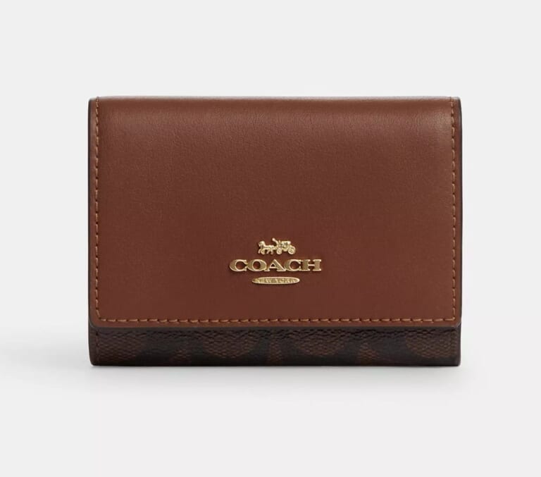 Coach Outlet Women's Wallets: Up to 70% off + free shipping w/ $50