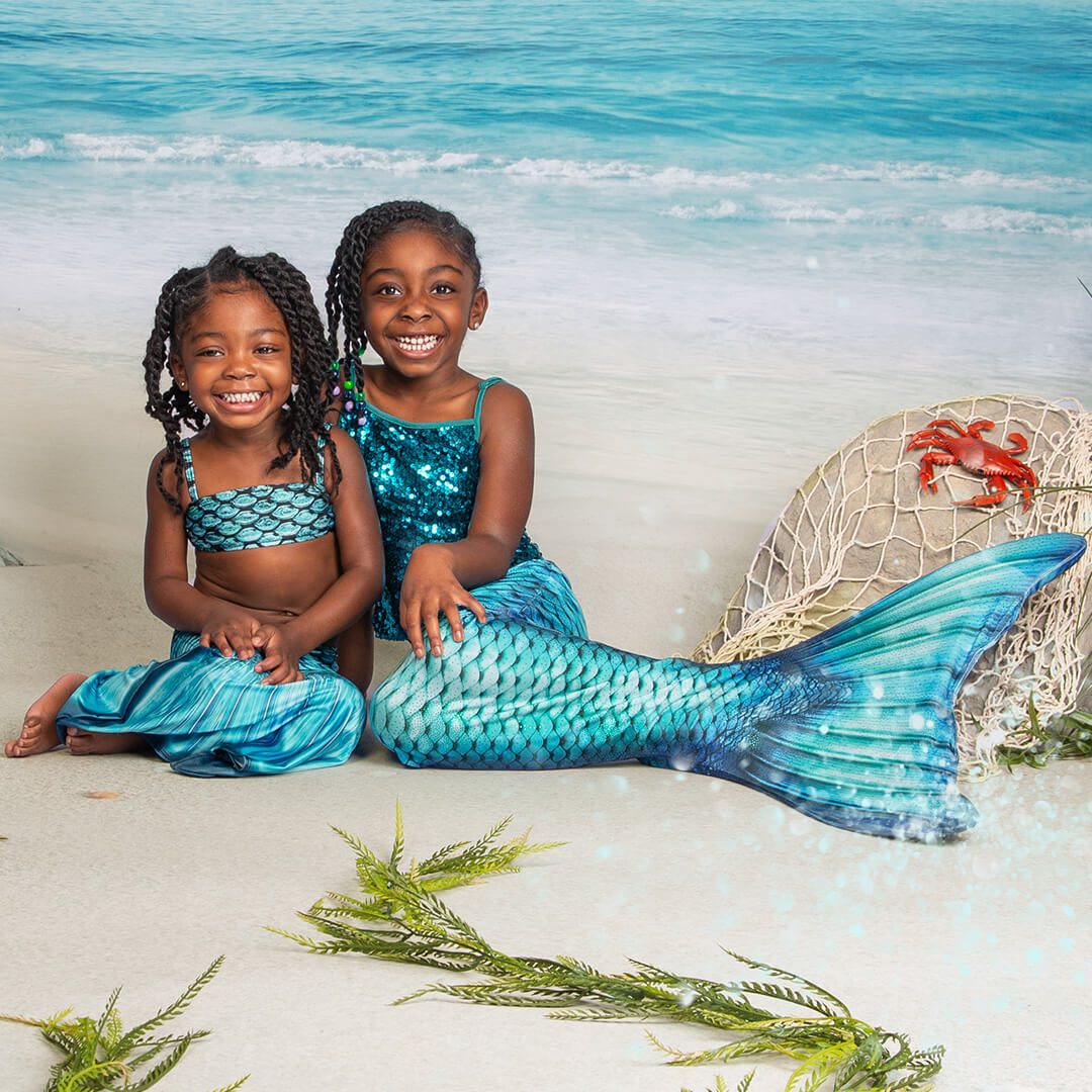 two girls posing for a family portrait