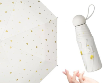 Shield yourself in style with this Mini Travel Umbrella for just $8.39 After Code (Reg. $13.99)