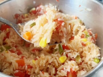 Make this easy Mexican rice during your next taco night! Combine rice with some Rotel, broth, and spices and you
